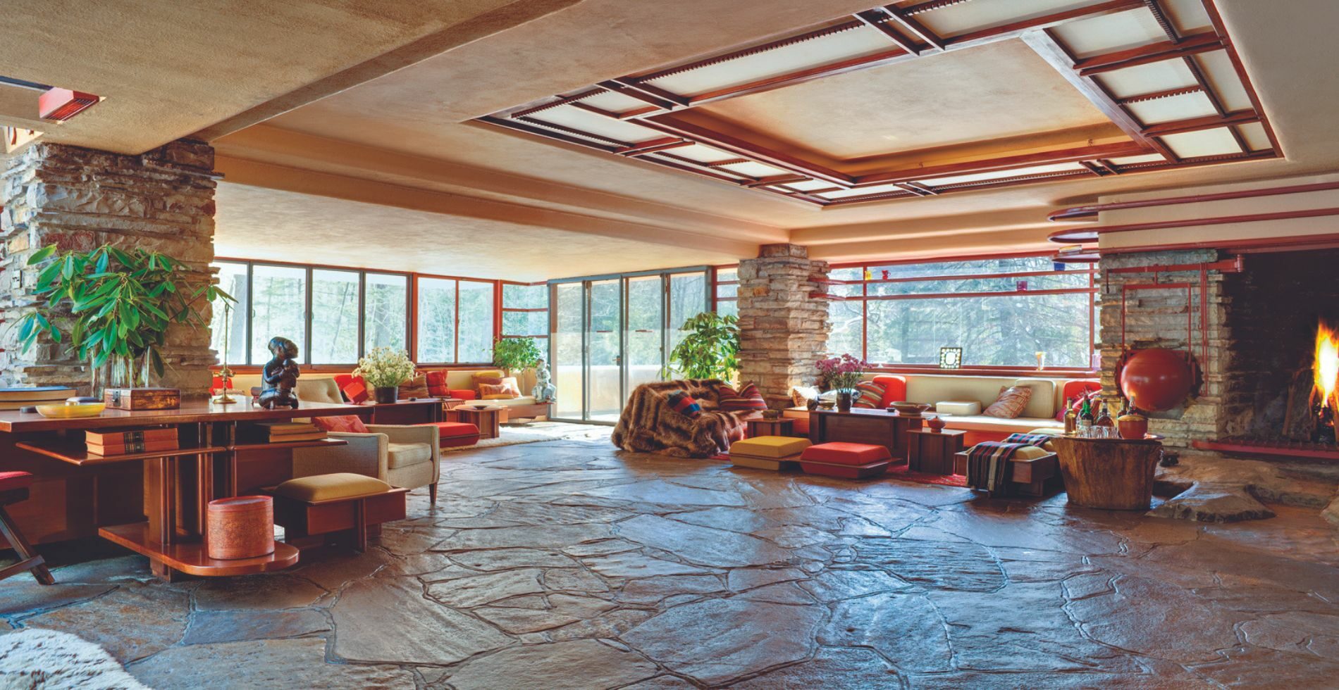 A view of the living room in the famous “Falling Water” home designed by Frank Lloyd Wright