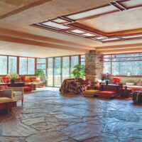 A view of the living room in the famous “Falling Water” home designed by Frank Lloyd Wright