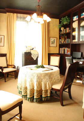 Library with table and books